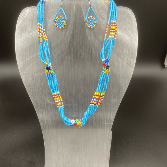 Handmade- Maasai Naapok Bead Project Jewelry - NWOT Aqua Maasai Multi Strand Bead w/multi colored flowers-Stndrd Length w/clsp